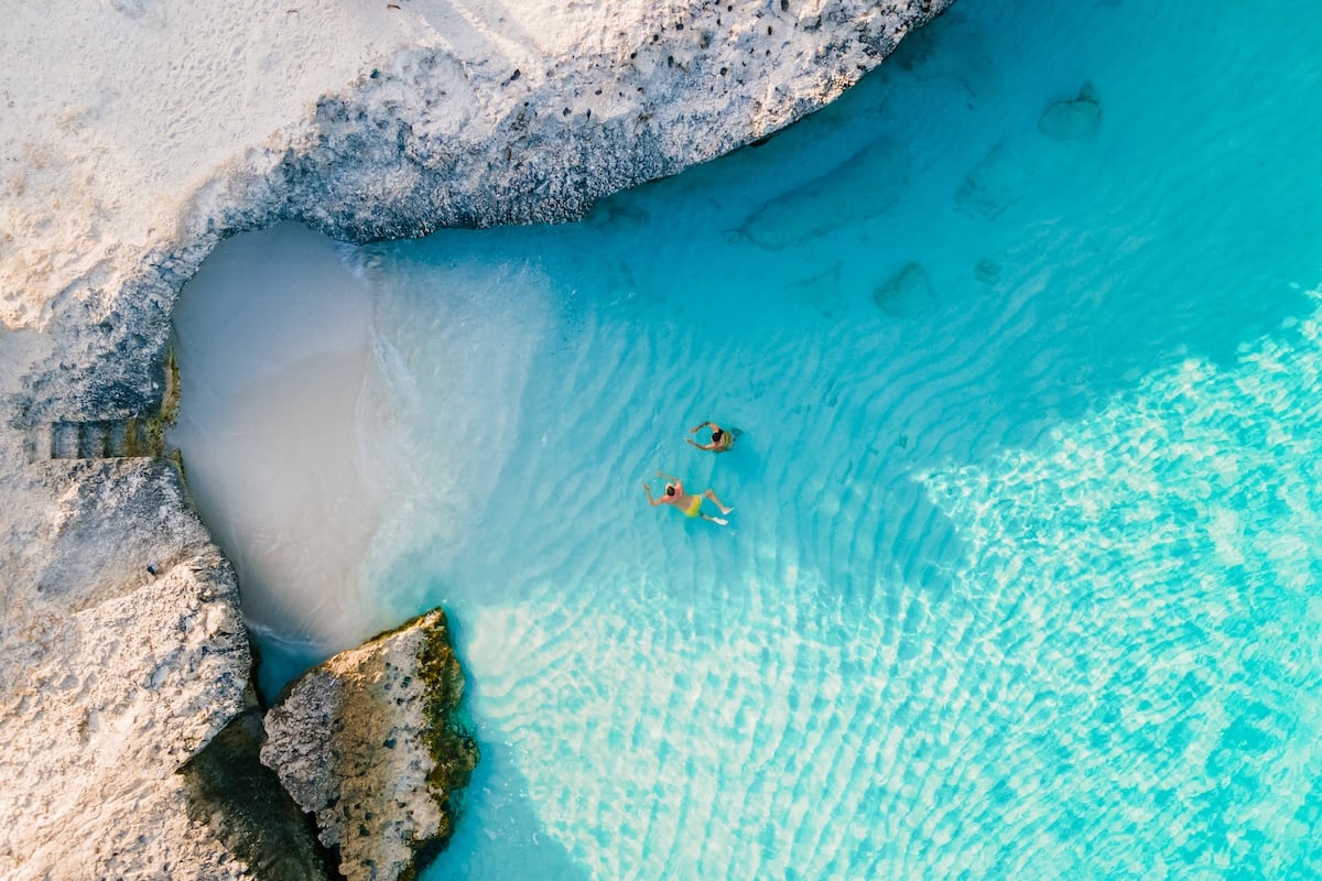Couple Swimming on Aruba Vacation.